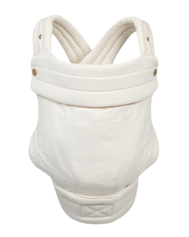 The Mabē Monarch Buckle Carrier in Ivory, which is solid ivory cotton/linen fabric.