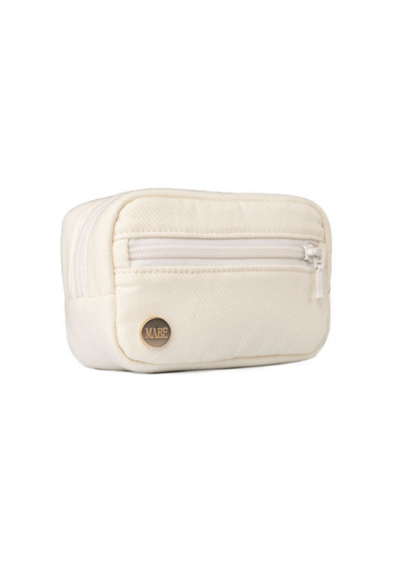 The Mabē Monarch Accessory Bag in Ivory, which is solid ivory colored cotton/linen fabric.