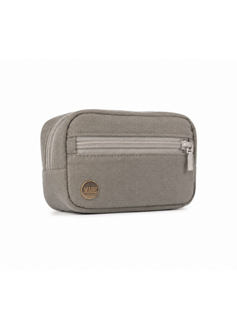 The Mabē Monarch Accessory Bag in Stone Sage, which is solid greenish gray cotton/linen fabric.