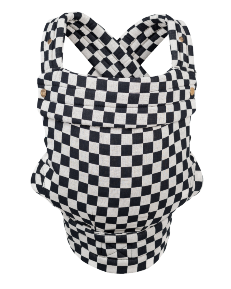 The Mabē Monarch Buckle Carrier in Ebony Check, which is black and natural checker-patterned cotton/linen fabric.
