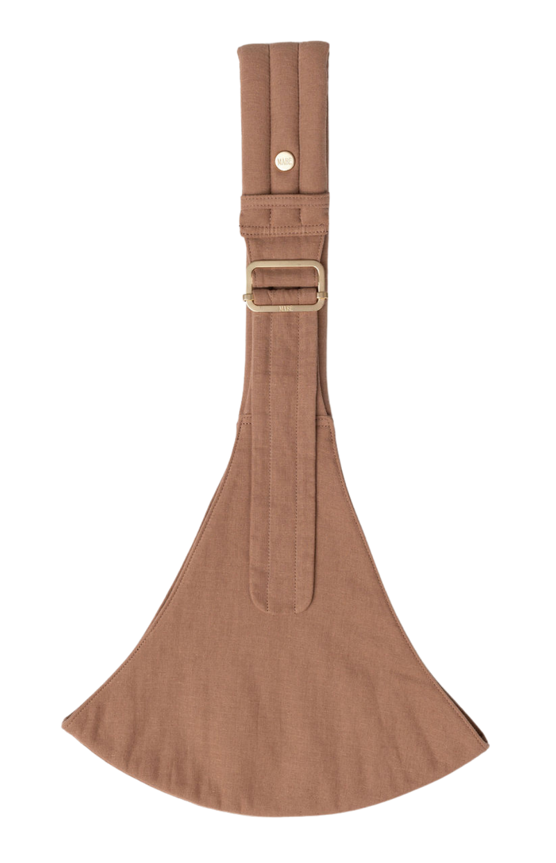 The Mabē Monarch Toddler Sling in Mocha, which is solid pinkish brown cotton/linen fabric.