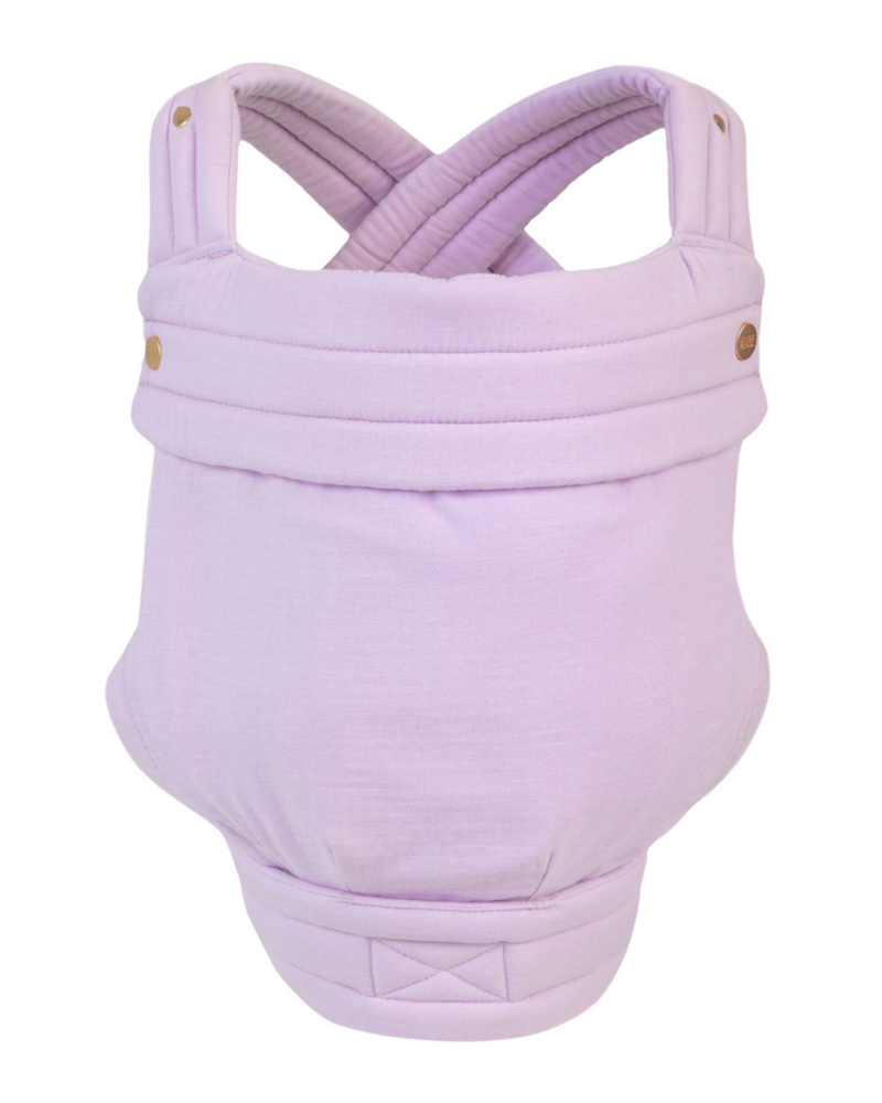 The Mabē Monarch Buckle Carrier in Lilac Skies, which is solid lilac cotton/linen fabric.