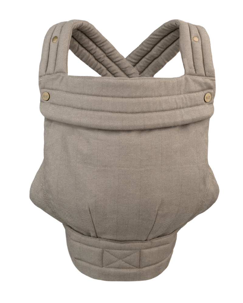 The Mabē Monarch Buckle Carrier in Stone Sage, which is solid greenish gray cotton/linen fabric.