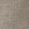 Close-up of the Mabē Monarch Charles Herringbone fabric, which is  textured brown and ecru fabric with a herringbone pattern